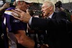 MINNEAPOLIS - JANUARY 17:  Jerry Jones, Owner and General Manager of the Dallas Cowboys, congratulates quarterback Brett Favre #4 of the Minnesota Vikings on their 34-3 victory during the NFC Divisional Playoff Game at Hubert H. Humphrey Metrodome on January 17, 2010 in Minneapolis, Minnesota.  (Photo by Elsa/Getty Images)