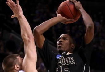 PORTLAND, OR - MARCH 21:  JaJuan Johnson #25 of the Purdue Boilermakers goes up for a shot over Jon Brockman #40 of the Washington Huskies in the second half during the second round of the NCAA Division I Men's Basketball Tournament at the Rose Garden on March 21, 2009 in Portland, Oregon.  (Photo by Jonathan Ferrey/Getty Images)