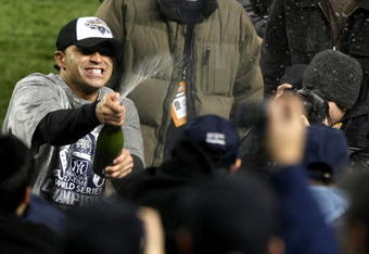NEW YORK - NOVEMBER 04:  Jerry Hairston Jr. #17 of the New York Yankees celebrates with fans after their 7-3 win against the Philadelphia Phillies in Game Six of the 2009 MLB World Series at Yankee Stadium on November 4, 2009 in the Bronx borough of New York City.  (Photo by Al Bello/Getty Images)