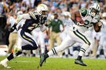 SAN DIEGO - JANUARY 17:  Running back Shonn Greene #23 of the New York Jets runs for a 53-yard touchdown in the fourth quarter against the San Diego Chargers in the AFC Divisional Playoff Game at Qualcomm Stadium on January 17, 2010 in San Diego, California.  (Photo by Robert Laberge/Getty Images)