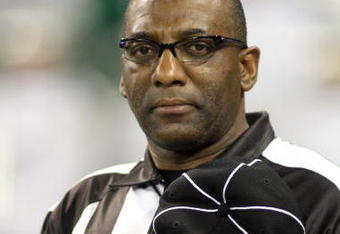 TORONTO - DECEMBER 3:  An NFL line judge stands for the National Anthems prior to the NFL game between the New York Jets and the Buffalo Bills on December 3, 2009  at Rogers Centre in Toronto, Ontario, Canada. The Jets defeated the Bills 19-13. (Photo by Rick Stewart/Getty Images)