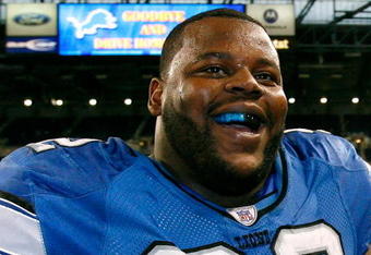 DETROIT - NOVEMBER 04:  Defensive tackle Shaun Rogers #92 of the Detroit Lions smiles at the fans after their 44-7 win over the Denver Broncos at Ford Field November 4, 2007 in Detroit, Michigan.  (Photo by Kevin C. Cox/Getty Images)