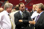 MONTREAL, QC - JUNE 26:  President & General Manager Brian Burke (L) and head coach Ron Wilson (R) of the Toronto Maple Leafs talk with Genral Manager Joe Nieuwendyk of the Dallas Stars prior to the first round of the 2009 NHL Entry Draft at the Bell Centre on June 26, 2009 in Montreal, Quebec, Canada.  (Photo by Bruce Bennett/Getty Images)