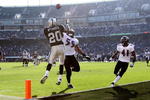 OAKLAND, CA - JANUARY 03:  Darren McFadden #20 of the Oakland Raiders can't hang on to a pass as Dannell Ellerbe #59 of the Baltimore Ravens defends during an NFL game at Oakland-Alameda County Coliseum on January 3, 2010 in Oakland, California.  (Photo by Jed Jacobsohn/Getty Images)