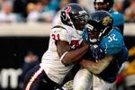 JACKSONVILLE, FL - DECEMBER 06:  Maurice Jones-Drew #32 of the Jacksonville Jaguars is tackled by Bernard Pollard #31 of the Houston Texans during the game at Jacksonville Municipal Stadium on December 6, 2009 in Jacksonville, Florida.  (Photo by Sam Greenwood/Getty Images)
