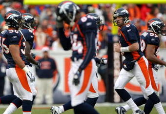 DENVER - JANUARY 03: Quarterback Kyle Orton #8 of the Denver Broncos and the offense head for the bench as the punting squad enters the field against the Kansas City Chiefs during NFL action at Invesco Field at Mile High on January 3, 2010 in Denver, Colorado. The Chiefs defeated the Broncos 44-24. (Photo by Doug Pensinger/Getty Images)