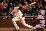 SAN FRANCISCO - SEPTEMBER 15:  Bengie Molina #1 of the San Francisco Giants hits a single that scored Randy Winn to give the Giants a 8-2 lead over the Colorado Rockies in the sixth inning at AT&T Park on September 15, 2009 in San Francisco, California. (Photo by Ezra Shaw/Getty Images)