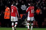 LONDON, ENGLAND - JANUARY 20:  William Gallas of Arsenal (R) and Bacary Sagna of Arsenal hold a shirt in relation to the Haiti earthquake during the Barclays Premier League match between Arsenal and Bolton Wanderers at The Emirates Stadium on January 20, 2010 in London, England.  (Photo by Julian Finney/Getty Images)