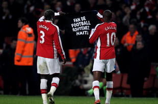 LONDON, ENGLAND - JANUARY 20:  William Gallas of Arsenal (R) and Bacary Sagna of Arsenal hold a shirt in relation to the Haiti earthquake during the Barclays Premier League match between Arsenal and Bolton Wanderers at The Emirates Stadium on January 20, 2010 in London, England.  (Photo by Julian Finney/Getty Images)
