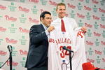 PHILADELPHIA - DECEMBER 16: Pitcher Roy Halladay of the Philadelphia Phillies and senior vice president and general manager Ruben Amaro, Jr. pose for a photograph on December 16, 2009 at Citizens Bank Park in Philadelphia, Pennsylvania. (Photo by Drew Hallowell/Getty Images)
