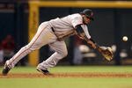 PHOENIX - SEPTEMBER 23:  Infielder Pablo Sandoval #48 of the San Francisco Giants is unable to field a single hit by the Arizona Diamondbacks during the major league baseball game at Chase Field on September 23, 2009 in Phoenix, Arizona.  (Photo by Christian Petersen/Getty Images)