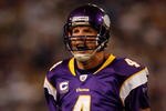 MINNEAPOLIS - JANUARY 17:  Quarterback Brett Favre #4 of the Minnesota Vikings celebrates touchdown in the second quarter against the Dallas Cowboys during the NFC Divisional Playoff Game at Hubert H. Humphrey Metrodome on January 17, 2010 in Minneapolis, Minnesota.  (Photo by Elsa/Getty Images)