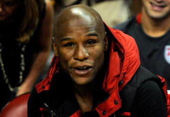 LAS VEGAS - OCTOBER 15:  Boxer Floyd Mayweather Jr. watches the preseason game between the Los Angeles Lakers and the Sacramento Kings at the Thomas & Mack Center October 15, 2009 in Las Vegas, Nevada. NOTE TO USER: User expressly acknowledges and agrees that, by downloading and/or using this Photograph, user is consenting to the terms and conditions of the Getty Images License Agreement.  (Photo by Ethan Miller/Getty Images)
