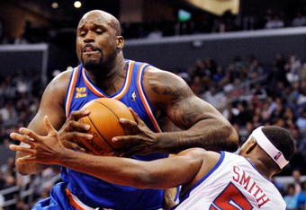 LOS ANGELES, CA - JANUARY 16:  Shaquille O'Neal #33 of the Cleveland Caveliers throws an elbow while defended by Craig Smith #5  of the Los Angeles Clippers during the second quarter of the NBA basketball game at Staples Center on January 16, 2010 in Los Angeles, California. NOTE TO USER: User expressly acknowledges and agrees that, by downloading and or using this photograph, User is consenting to the terms and conditions of the Getty Images License Agreement.  (Photo by Kevork Djansezian/Getty Images)