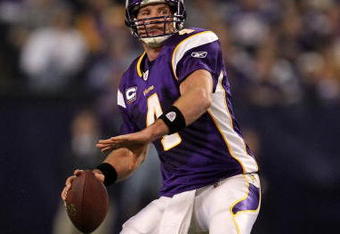 MINNEAPOLIS - JANUARY 17:  Quarterback Brett Favre #4 of the Minnesota Vikings throws a pass against the Dallas Cowboys during the fourth quarter of the NFC Divisional Playoff Game at Hubert H. Humphrey Metrodome on January 17, 2010 in Minneapolis, Minnesota.  The Vikings defeated the Cowboys 34-3.  (Photo by Chris McGrath/Getty Images)