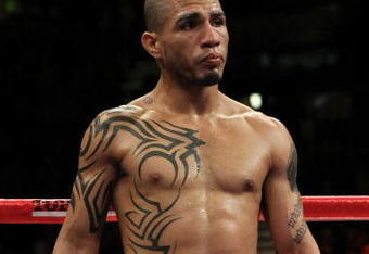 LAS VEGAS - NOVEMBER 14:  Miguel Cotto of Puerto Rico looks on from the ring before losing to Manny Pacquiao by 12th round TKO during their WBO welterweight title fight at the MGM Grand Garden Arena on November 14, 2009 in Las Vegas, Nevada.  (Photo by Al Bello/Getty Images)