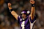 MINNEAPOLIS - JANUARY 17:  Quarterback Brett Favre 4# of the Minnesota Vikings celebrates touchdown in the second quarter against the Dallas Cowboys during the NFC Divisional Playoff Game at Hubert H. Humphrey Metrodome on January 17, 2010 in Minneapolis, Minnesota.  (Photo by Elsa/Getty Images)