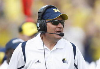 ANN ARBOR, MI - SEPTEMBER 5:  Head coach Rich Rodriguez of the Michigan Wolverines looks on during the game against the Western Michigan Broncos on September 5, 2009 at Michigan Stadium in Ann Arbor, Michigan. (Photo by Gregory Shamus/Getty Images) 