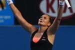 MELBOURNE, AUSTRALIA - JANUARY 22:  Nadia Petrova of Russia celebrates after winning her third round match against Kim Clijsters of Belgium during day five of the 2010 Australian Open at Melbourne Park on January 22, 2010 in Melbourne, Australia.  (Photo by Quinn Rooney/Getty Images)