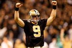 NEW ORLEANS - JANUARY 16:  Drew Brees #9 of the New Orleans Saints reacts in the first half against the Arizona Cardinals during the NFC Divisional Playoff Game at Louisana Superdome on January 16, 2010 in New Orleans, Louisiana.  (Photo by Ronald Martinez/Getty Images)