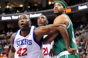 PHILADELPHIA - NOVEMBER 03:  Elton Brand #42 and Thaddeus Young #21 of the Philadelphia 76ers box out against Rasheed Wallace of the Boston Celtics at the Wachovia Center on November 3, 2009 in Philadelphia, Pennsylvania.  NOTE TO USER: User expressly acknowledges and agrees that, by downloading and or using this photograph, User is consenting to the terms and conditions of the Getty Images License Agreement.  (Photo by Chris Chambers/Getty Images)