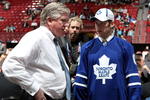MONTREAL, QC - JUNE 27:  Kenny Ryan speaks to General Manager Brian Burke of the Toronto Maple Leafs organization after he was drafted by the Leafs in the second round during the 2009 NHL Entry Draft at the Bell Centre on June 27, 2009 in Montreal, Quebec, Canada. (Photo by Bruce Bennett/Getty Images) 