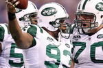 INDIANAPOLIS - DECEMBER 27:  Marques Douglas #93 of the New York Jets celebrates a touchdown during the NFL game against the Indianapolis Colts at Lucas Oil Stadium on December 27, 2009 in Indianapolis, Indiana. Peyton Manning and many of the Colts starters  were pulled from the game in the second half and the Colts went on to lose their first game of the season 29-15.  (Photo by Andy Lyons/Getty Images)