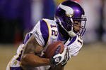 CHICAGO - DECEMBER 28: Percy Harvin #12 of the Minnesota Vikings fields a kick against the Chicago Bears at Soldier Field on December 28, 2009 in Chicago, Illinois. The Bears defeated the Vikings 36-30 in overtime. (Photo by Jonathan Daniel/Getty Images)