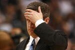 TAMPA, FL - MARCH 21:  Coach Keno Davis of the Drake Bulldogs holds his head as he leaves the court after his team lost in overtime to the Western Kentucky Hilltoppers during the first round of the 2008 NCAA Tournament West Regional at the St. Pete Times Forum on March 21, 2008 in Tampa, Florida.  (Photo by Doug Benc/Getty Images)
