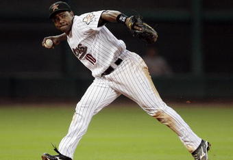 HOUSTON - SEPTEMBER 23:  Shortstop Miguel Tejada #10 of the Houston Astros throws to first at Minute Maid Park on September 23, 2009 in Houston, Texas. Houston won 3-0.  (Photo by Bob Levey/Getty Images)