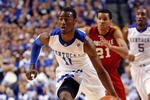 LEXINGTON, KY - JANUARY 02:  John Wall #11 of the Kentucky Wildcats dribbles the ball during the game against the Louisville Cardinals at Rupp Arena on January 2, 2010 in Lexington, Kentucky.  Kentucky won 71-62.  (Photo by Andy Lyons/Getty Images)