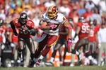 LANDOVER, MD - OCTOBER 4:  Chris Cooley #47 of the Washington Redskins runs the ball against the Tampa Bay Buccaneers at FedExField on October 4, 2009 in Landover, Maryland. The Redskins defeated the Buccaneers 16-13. (Photo by Larry French/Getty Images)