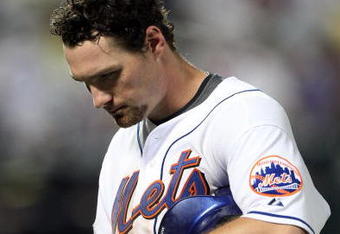 NEW YORK - AUGUST 20:  Daniel Murphy #28 of the New York Mets walks back to the dugout after popping out for the final out of the game against the Atlanta Braves on August 20, 2009 at Citi Field in the Flushing neighborhood of the Queens borough of New York City.  (Photo by Jim McIsaac/Getty Images)