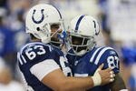 INDIANAPOLIS - SEPTEMBER 06:  Reggie Wayne #87 of the Indianapolis Colts celebrates a touchdown with Jeff Saturday #63 against the New Orleans Saints in the first NFL game of the season at the RCA Dome on September 6, 2007 in Indianapolis, Indiana.  (Photo by Jonathan Daniel/Getty Images)