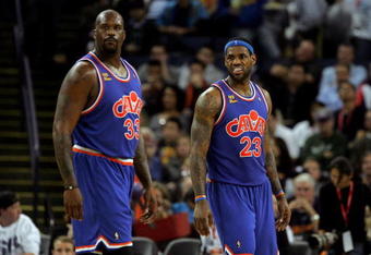 OAKLAND, CA - JANUARY 11:  LeBron James #23 and Shaquille O'Neal #33 of the Cleveland Cavaliers stand on the court during their game against the Golden State Warriors at Oracle Arena on January 11, 2010 in Oakland, California.  NOTE TO USER: User expressly acknowledges and agrees that, by downloading and/or using this Photograph, user is consenting to the terms and conditions of the Getty Images License Agreement.  (Photo by Ezra Shaw/Getty Images)