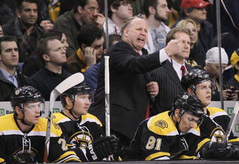 BOSTON - JANUARY 21:  Head coach Claude Julien of the Boston Bruins reacts after a double minor penalty is called on Milan Lucic of the Bruins in the final minutes of the game against the Columbus Blue Jackets on January 21, 2010 at the TD Garden in Boston, Massachusetts. The Blue Jackets defeated the Bruins 3-2.  (Photo by Elsa/Getty Images)