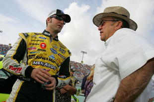 HOMESTEAD, FL - NOVEMBER 22:  Paul Menard (L), driver of the #98 Johns Manville/Menards Ford, talks with team owner Jack Roush on the grid prior to the start of the NASCAR Sprint Cup Series Ford 400 at Homestead-Miami Speedway on November 22, 2009 in Homestead, Florida.  (Photo by Todd Warshaw/Getty Images)