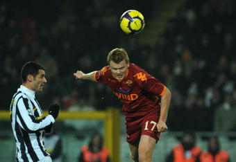 TURIN, ITALY - JANUARY 23:  John Arne Riise of AS Roma scores his goal during the Serie A match between Juventus FC and AS Roma at Olimpico Stadium on January 23, 2010 in Turin, Italy.  (Photo by Valerio Pennicino/Getty Images)