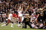 NEW ORLEANS - DECEMBER 27:  Kicker Connor Barth #10 of the Tampa Bay Buccaneers celebrates after kicking the winning field goal to defeat the New Orleans Saints 20-17 in overtime on December 27, 2009 at Louisiana Superdome in New Orleans, Louisiana.  (Photo by Jamie Squire/Getty Images)