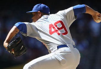 PHOENIX - APRIL 29:  Relief pitcher Carlos Marmol #49 of the Chicago Cubs pitches against the Arizona Diamondbacks during the game at Chase Field on April 29, 2009 in Phoenix, Arizona. The Diamondbacks defeated the Cubs 10-0.  (Photo by Christian Petersen/Getty Images)