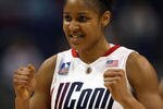 ST. LOUIS - APRIL 05:   Maya Moore #23 of the Connecticut Huskies celebrates a point on April 5, 2009 during the Womens Final Four Semifinals at the Scottrade Center on April 5, 2009 in St. Louis, Missouri. Connecticut defeated the Stanford Cardinal 83-64.  (Photo by Elsa/Getty Images)