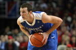 LOUISVILLE, KY - JANUARY 4:  Michael Porter #13 of the Kentucky Wildcats holds the ball during the game against the Louisville Cardinals on January 4, 2009 at Freedom Hall in Louisville, Kentucky. (Photo by Andy Lyons/Getty Images)