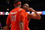 NEW YORK - NOVEMBER 20:  Wes Johnson #4 and Arinze Onuaku #21 of the Syracuse Orange celebrate after defeating the North Carolina Tar Heels in the championship game of the 2K Sports Classic on November 20, 2009 at Madison Square Garden in New York City. The Orange defeated the Tar Heels 87-71 to win the championship.  (Photo by Jim McIsaac/Getty Images)
