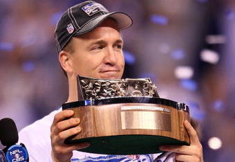 INDIANAPOLIS - JANUARY 24:  Quarterback Peyton Manning #18 of the Indianapolis Colts holds the Lamar Hunt trophy after the Colts defeated the New York Jets 30-17 to win the AFC Championship Game at Lucas Oil Stadium on January 24, 2010 in Indianapolis, Indiana.  (Photo by Andy Lyons/Getty Images)