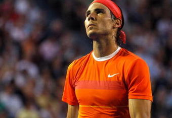 MELBOURNE, AUSTRALIA - JANUARY 26:  Rafael Nadal of Spain looks up at the big screen in his quarterfinal match against Andy Murray of Great Britain during day nine of the 2010 Australian Open at Melbourne Park on January 26, 2010 in Melbourne, Australia.  (Photo by John Donegan-Pool/Getty Images)
