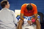 MELBOURNE, AUSTRALIA - JANUARY 26:  Rafael Nadal of Spain recieves medical attention between games in his quarterfinal match against Andy Murray of Great Britain during day nine of the 2010 Australian Open at Melbourne Park on January 26, 2010 in Melbourne, Australia.  (Photo by Clive Brunskill/Getty Images)