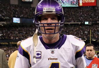 NEW ORLEANS - JANUARY 24:  Brett Favre #4 of the Minnesota Vikings walks off the field after the Vikings lost to the New Orleans Saints 31-28 in overtime during the NFC Championship Game at the Louisiana Superdome on January 24, 2010 in New Orleans, Louisiana.  (Photo by Jed Jacobsohn/Getty Images)