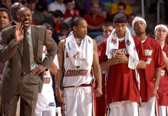 MILWAUKEE - MARCH 19:  Head coach Al Skinner of the Boston College Eagles yells instructions as his team watches the first round game of the NCAA Division I Men's Basketball Tournament against the Utah Runnin' Utes on March 19, 2004 at Bradley Center in Milwaukee, Wisconsin.  (Photo by Jonathan Daniel/Getty Images)