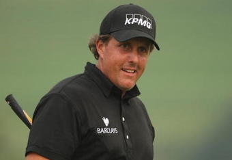 SHANGHAI, CHINA - NOVEMBER 08:  Phil Mickelson of the USA celebrates a birdie putt on the 17th green during the final round of the WGC-HSBC Champions at Sheshan International Golf Club on November 8, 2009 in Shanghai, China.  (Photo by Andrew Redington/Getty Images)