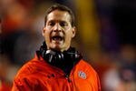 BATON ROUGE, LA - OCTOBER 24:  Head coach Gene Chizik of the Auburn Tigers calls to a referee during the game against the Louisiana State University Tigers at Tiger Stadium on October 24, 2009 in Baton Rouge, Louisiana.  (Photo by Chris Graythen/Getty Images)